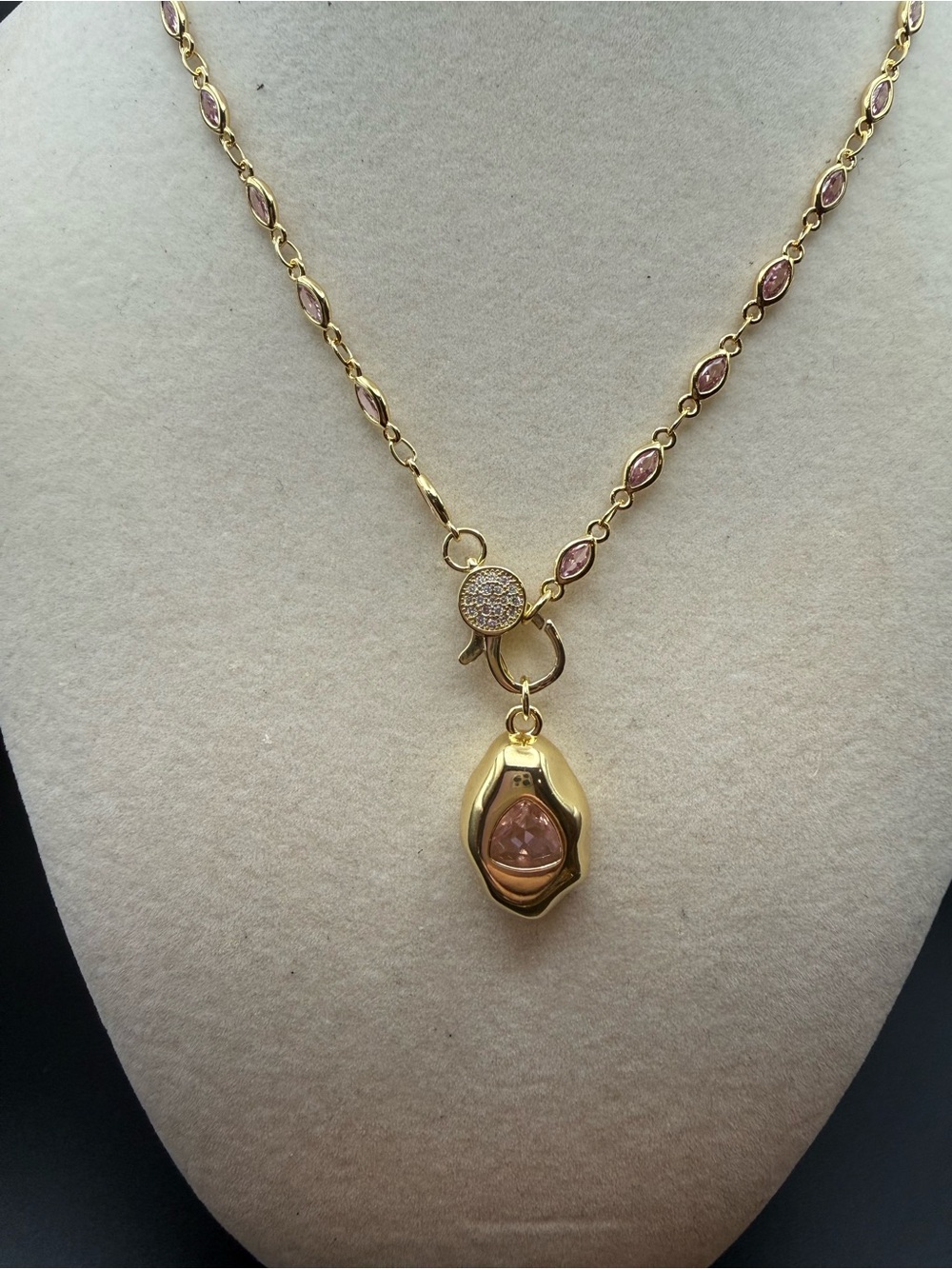 Gold-Tone Necklace with Pink Crystal Accents and pink and gold charm